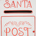 White mail slot with red trim labeled Santa Post for Christmas letters