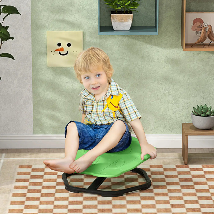Child sitting on a green balance board in a room with a checkered floor and light green walls.