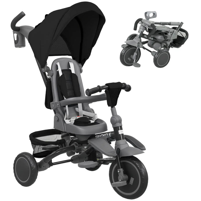 Gray and black children's tricycle with canopy on a white background