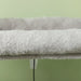 Soft gray plush pet bed with raised edges against a light green background