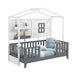 Children's bed with house-shaped canopy, gray mattress, and white walls.