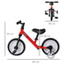 Red toddler balance bike with training wheels and black seat, showing measurements 85x54x36 cm