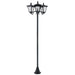 black three-head outdoor street lamp post with clear glass lanterns and pointed tops