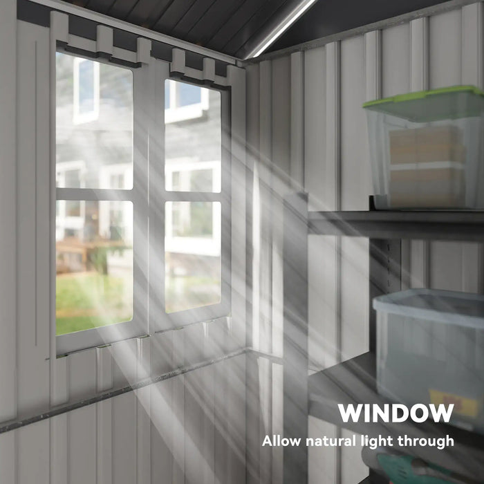 Sunlight streaming through a white-framed window into a gray storage room with shelves and plastic containers
