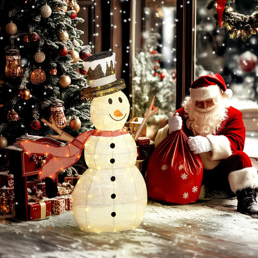 Santa Claus with red sack beside illuminated snowman decoration near Christmas tree with ornaments