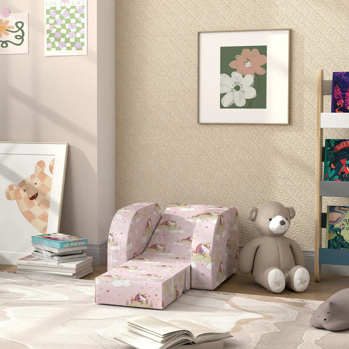 Kids playroom with pink unicorn-themed convertible foam chair, teddy bear, books, and floral wall art