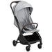 Gray stroller with a canopy on a white background