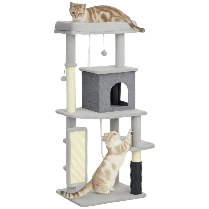 Light brown and white cats playing on multi-level gray cat tree with scratching posts and hanging toys