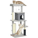 Light brown and white cats playing on multi-level gray cat tree with scratching posts and hanging toys