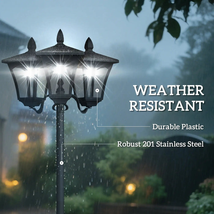 Weather resistant black outdoor lamp post with three bright lights in rain, made of durable plastic and stainless steel