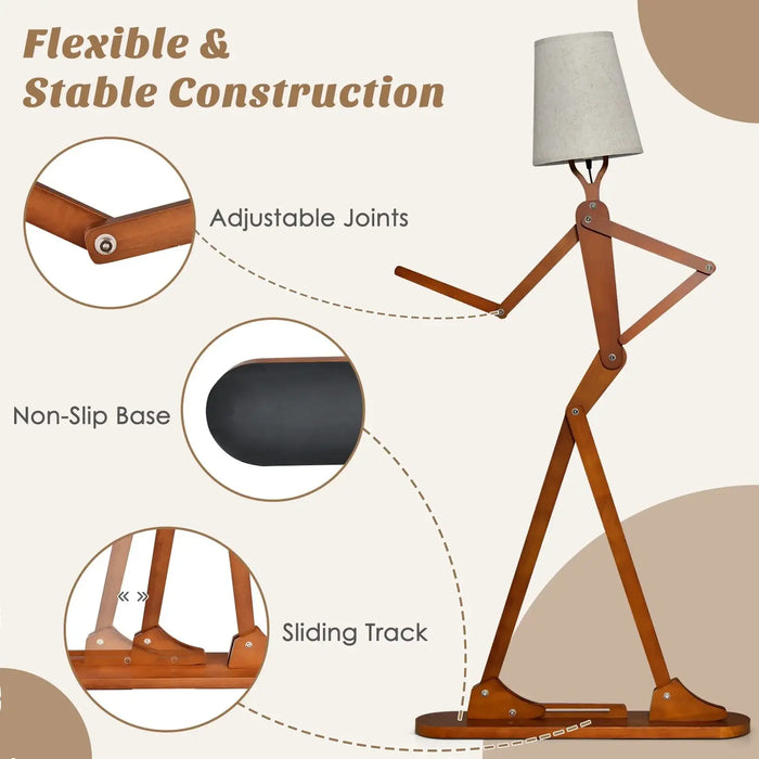 Wooden tall floor lamp shaped like a walking figure with adjustable joints, sliding track, and non-slip base