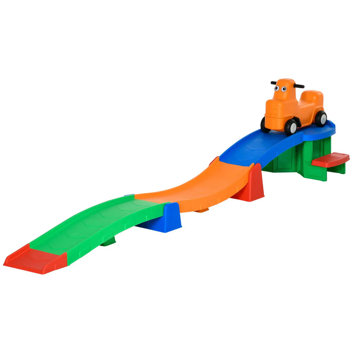 Colorful toy track with a small car on a white background