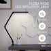 Modern desk lamp with geometric wall panels in a room setting, emphasizing ultra-wide illumination area.