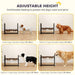 Dog feeding station with adjustable height for different dog sizes on a wooden floor.