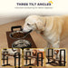 Dog eating from a raised pet feeder with three tilt angle options displayed.
