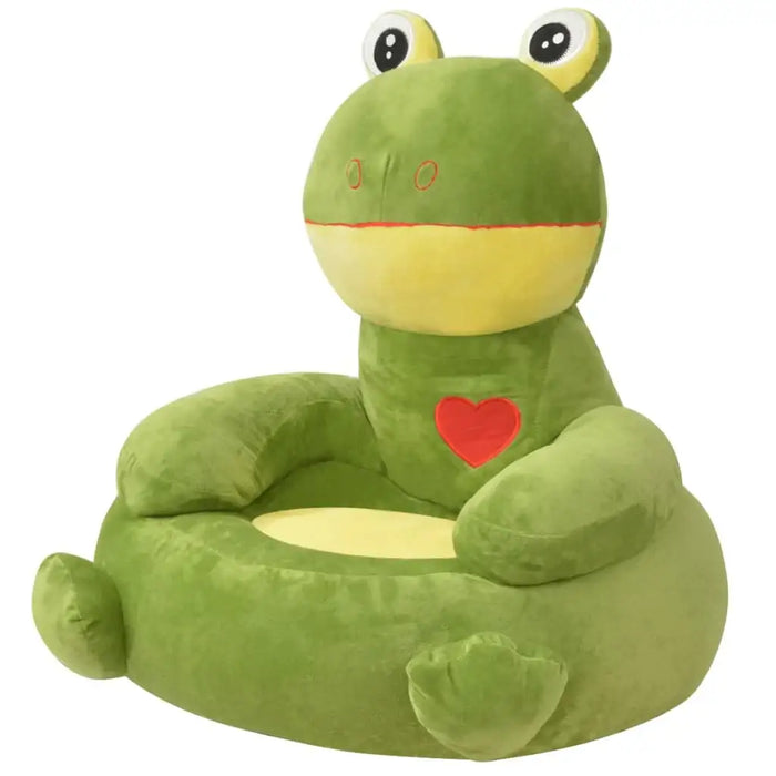 Green frog-shaped cushion with a red heart on a white background
