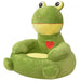 Green frog-shaped cushion with a red heart on a white background