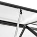 Close-up of aluminum greenhouse polycarbonate panel and metal support bracket.