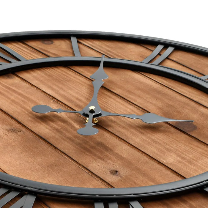 Wooden clock face with metal hands on a white background