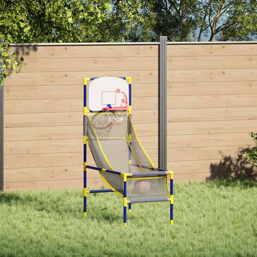Children's basketball hoop set against a wooden fence with greenery.