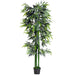 Artificial bamboo plant with green leaves on a white background