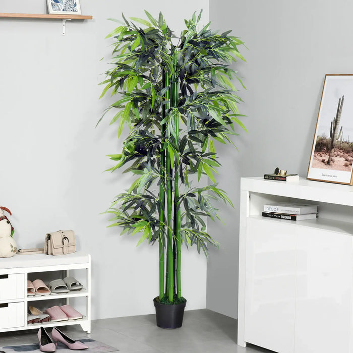 Potted artificial bamboo plant in a room setting with shelves and decor.