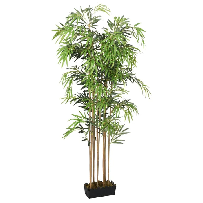 Artificial bamboo plant with green leaves on a white background