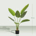 Artificial potted plant with measurements on a light gray background