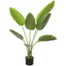 Potted artificial plant with large green leaves on a white background