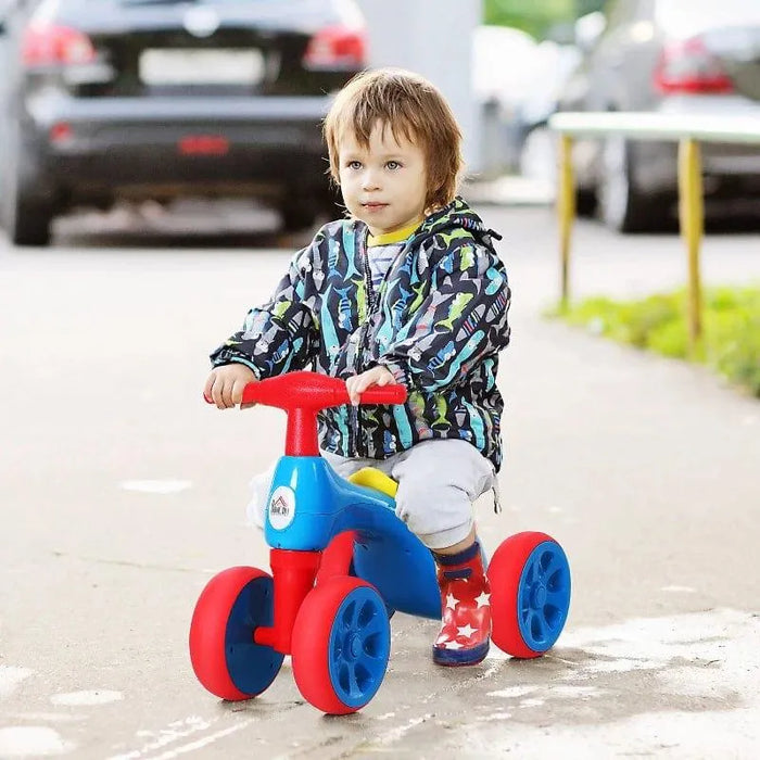 Baby Balance Bike - Blue, Red and Yellow | 4-Wheel Toddler Ride-On and Toy Bin HOMCOM - Little and Giant Explorers HOMCOM