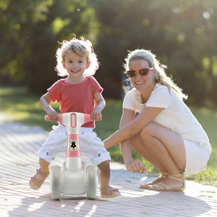 Baby Balance Bike for Toddlers – Pink | 4-Wheel Design - 135° Steering Limit COSTWAY - Little and Giant Explorers Costway