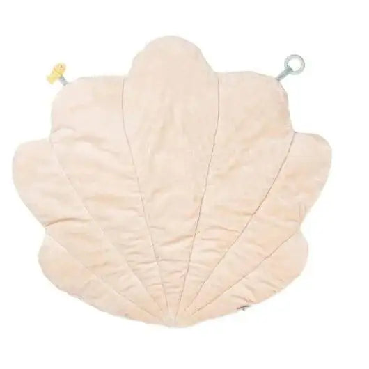 Soft shell-shaped baby playmat with pale pink padding and two toy loops on a white background.