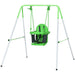 Green toddler swing with safety belt on metal frame for indoor and outdoor play