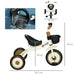 White toddler tricycle with adjustable seat, black basket, bell, and measurement labels