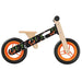 Orange and black balance bike with lightweight plywood frame, adjustable seat and handlebar