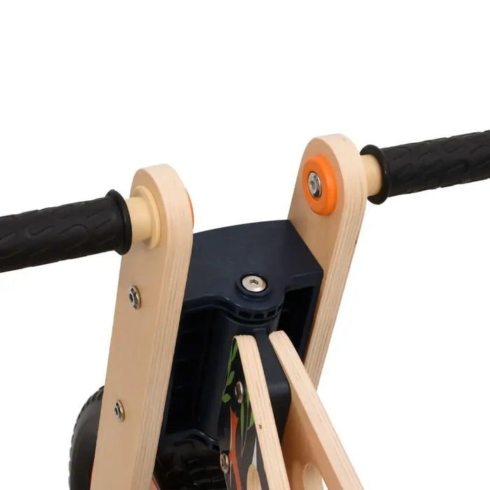 Close-up of lightweight plywood balance bike with adjustable black handlebar