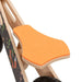 Orange seat on lightweight plywood balance bike with black tire and fox design frame