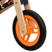Orange wheel on lightweight plywood frame balance bike for kids