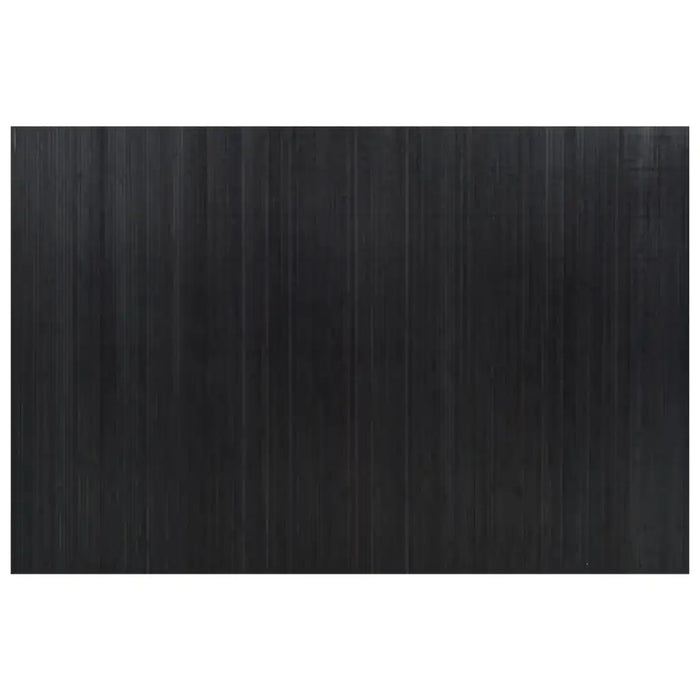 Black rectangular mat with a textured surface on a white background