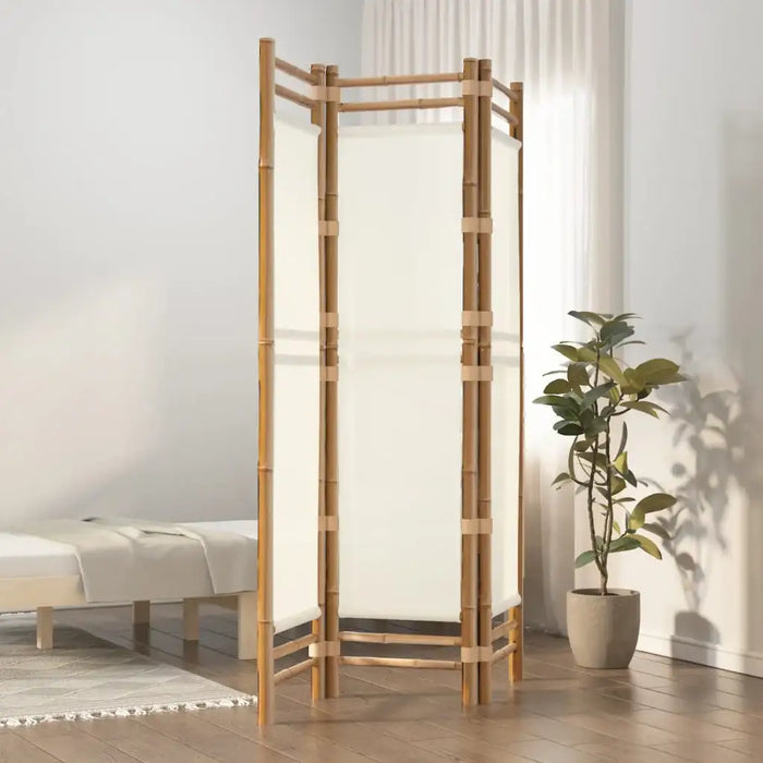 Three-panel bamboo room divider with white fabric in bright minimalist bedroom with bed and potted plant