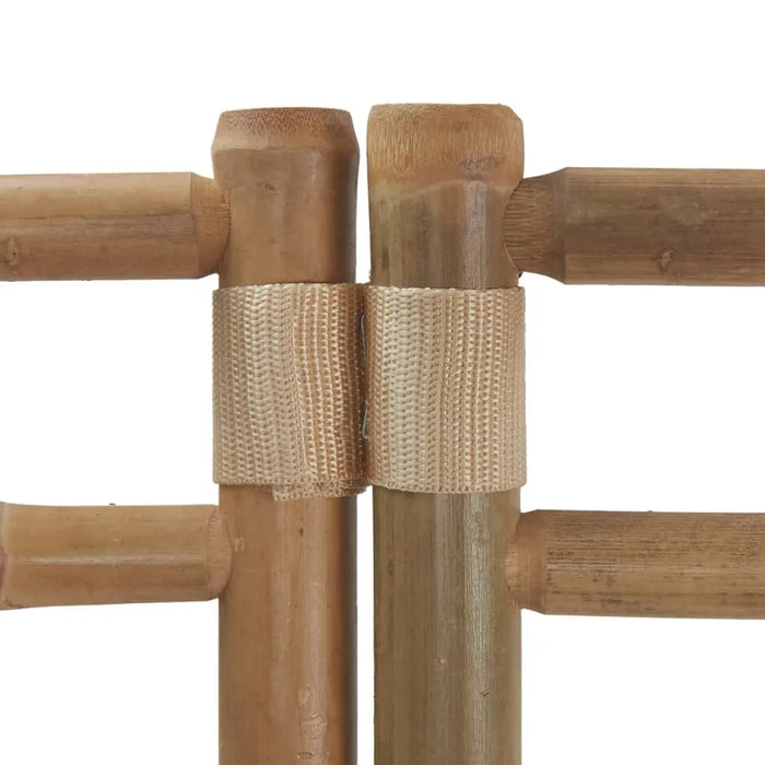 Close-up of natural bamboo sticks joined with beige woven fabric straps, eco-friendly kids toy detail