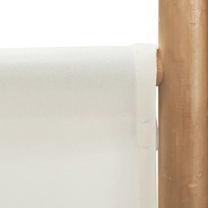 Close-up of cream-colored canvas fabric attached to a smooth wooden pole, minimalist design detail