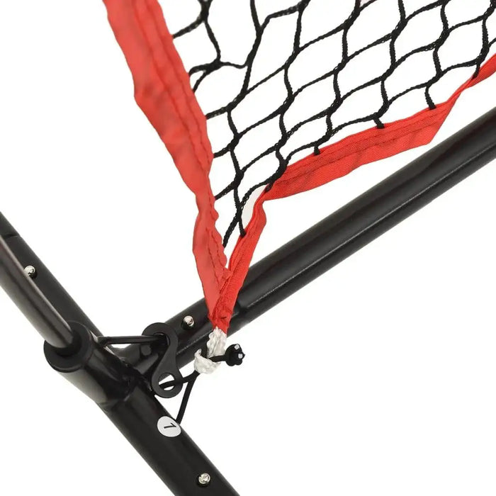 Close-up of baseball training net with black frame and red trim for pitching practice