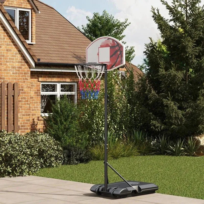 Adjustable portable basketball hoop with colorful net on patio in house garden