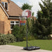 Adjustable portable basketball hoop with colorful net on patio in house garden