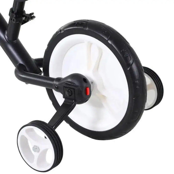 A close-up view of the rear wheel and training wheels of a HOMCOM Balance Training Bike with Removable Stabilisers. The large wheel has a black outer tire and a white inner section, while the smaller training wheels are positioned on either side of the main wheel. The adjustable height seat ensures comfort as your child grows.