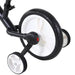 A close-up view of the rear wheel and training wheels of a HOMCOM Balance Training Bike with Removable Stabilisers. The large wheel has a black outer tire and a white inner section, while the smaller training wheels are positioned on either side of the main wheel. The adjustable height seat ensures comfort as your child grows.