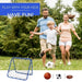 Family playing soccer outdoors with blue football rebounder net and various sports balls shown