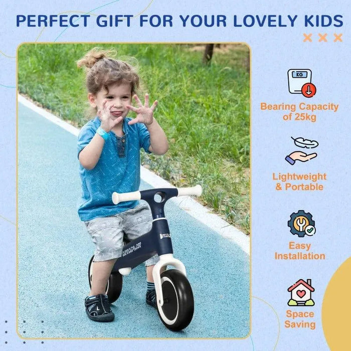 Young child riding blue kids balance bike with adjustable seat on outdoor path