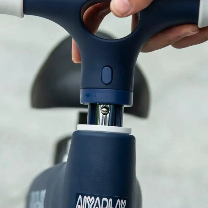 Close-up of a blue adjustable kids balance bike handlebar and seat, Aiyaplay logo visible